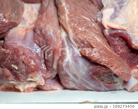 Pieces of beef. Cooking meat for minced meat. Beef fillet on the table. Ingredient for a colorful lunch. Pieces of beef. Cooking meat for minced meat. Beef fillet on the table. Ingredient for a colorful lunch. 109273450
