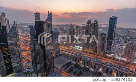 High-rise buildings on Sheikh Zayed Road in Dubai aerial day to night timelapse, UAE. High-rise buildings on Sheikh Zayed Road in Dubai aerial day to night timelapse, UAE. 109274102