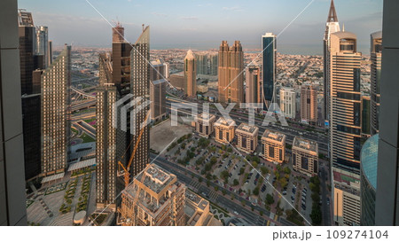 High-rise buildings on Sheikh Zayed Road in Dubai aerial morning timelapse, UAE. High-rise buildings on Sheikh Zayed Road in Dubai aerial morning timelapse, UAE. 109274104