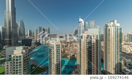 Panorama showing Dubai Downtown cityscape with tallest skyscrapers around aerial timelapse. 109274146