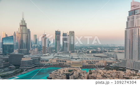 Aerial view of Dubai International Financial Centre district during sunset timelapse Aerial view of Dubai International Financial Centre district during sunset timelapse 109274304