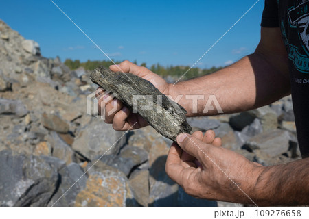 Industrial Mining Area with Graphite Deposit, Mineral Production, and Abundant Stones 109276658