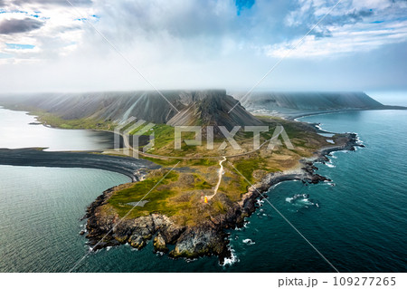 Eystrahorn or Krossasnesfjall mountain with foggy covered on Atlantic ocean in summer at Iceland 109277265