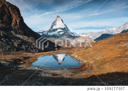 Riffelsee lake and Matterhorn mountain reflection at Switzerland Riffelsee lake and Matterhorn mountain reflection at Switzerland 109277307