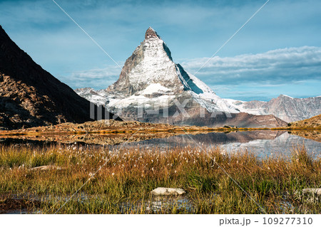 Riffelsee lake and Matterhorn mountain reflection at Switzerland Riffelsee lake and Matterhorn mountain reflection at Switzerland 109277310