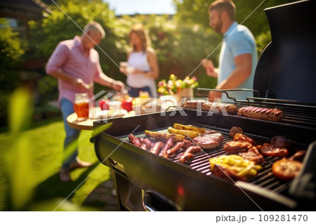 A group of people together at a bbq. Family and friends having a picnic barbeque grill in the garden. having fun eating and enjoying time. sunny day in the summer. blur background. Grilled vegetables. A group of people together at a bbq. Family and friends having a picnic barbeque grill in the garden. having fun eating and enjoying time. sunny day in the summer. blur background. Grilled vegetables. 109281470