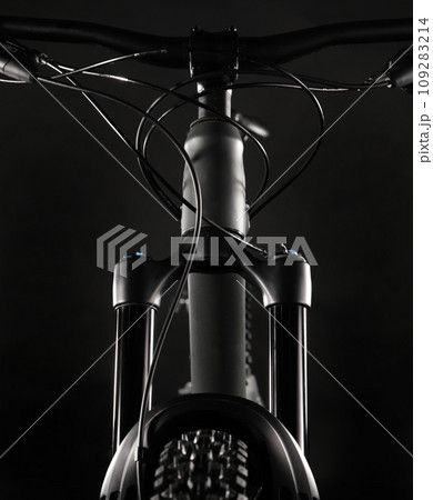 Mountain Bike Suspension Fork on Dark Background, Studio Shot Mountain Bike Suspension Fork on Dark Background, Studio Shot 109283214