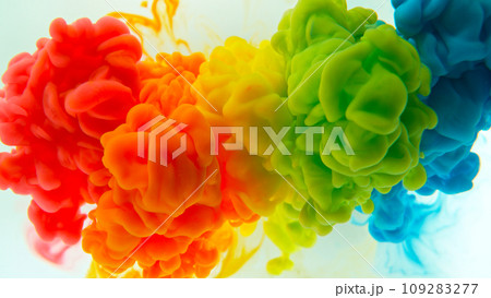 Abstract background, colorful liquid pouring isolated on white background, freeze motion 109283277