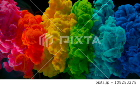 Abstract background, colorful liquid pouring isolated on black background, freeze motion 109283278