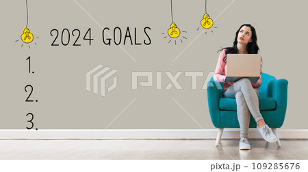 2024 goals with woman using a laptop 109285676