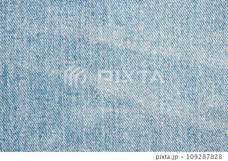 Denim blue jeans texture close up background top view Denim blue jeans texture close up background top view 109287828
