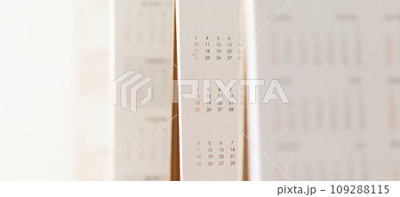 Close up calendar page dates and month background business planning appointment meeting concept Close up calendar page dates and month background business planning appointment meeting concept 109288115