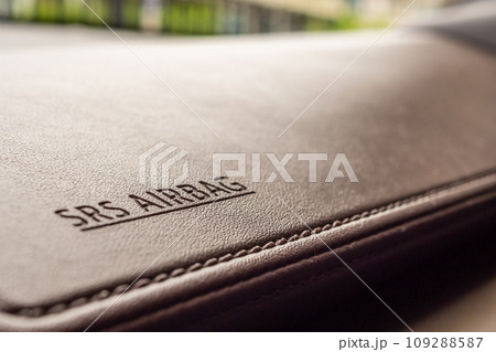 airbag safety sign on brown leather texture in modern car 109288587