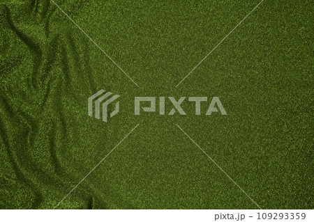 Background of draped dark green fabric with silver lurex thread 109293359