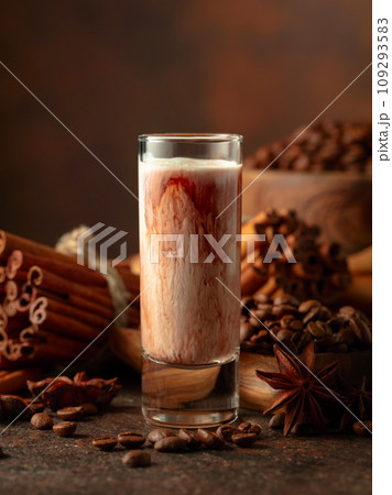 Cream and coffee liquor on a brown background. 109293583