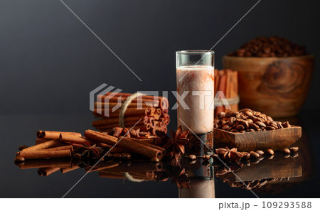 Coffee liquor with cream on a brown background. 109293588
