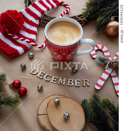 A set of festive objects, Christmas tree and Christmas decorations on a wooden background. Top view of the Christmas decoration concept with space to copy. A set of festive objects, Christmas tree and Christmas decorations on a wooden background. Top view of the Christmas decoration concept with space to copy. 109294226