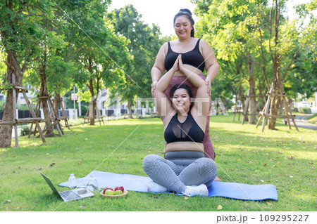 Asian female overweight in sportswear training exercise to lose weight 109295227