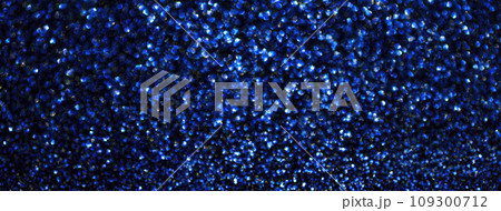 Blurred navy blue sparkling background from small sequins, macro. Blurred defocused sapphire backdrop Blurred navy blue sparkling background from small sequins, macro. Blurred defocused sapphire backdrop 109300712