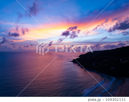 Amazing sunset or sunrise sky over sea landscape,Beautiful colorful light of nature seascape background,Drone aerial view ocean background 109302131