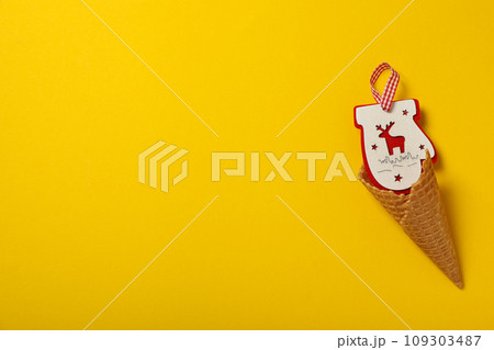 Crispy waffle cone with beautiful Christmas decorations Crispy waffle cone with beautiful Christmas decorations 109303487