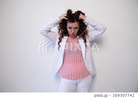 Beautiful brunette woman shaggy hair on white background 109307742