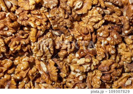 Scattered Shelled Walnuts. Background from Walnut Scattered Shelled Walnuts. Background from Walnut 109307829