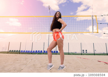 Young, beautiful girl athlete in sportswear is training at the stadium Young, beautiful girl athlete in sportswear is training at the stadium 109308504