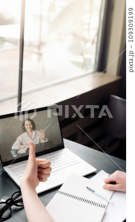 Virtual Meeting. Woman Engaged in Online Discussion or Web Conference. Online Work and Study. Woman Virtual Meeting. Woman Engaged in Online Discussion or Web Conference. Online Work and Study. Woman 109309199