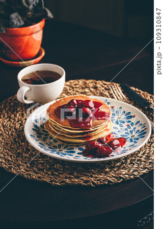 Stack of pancakes with dogwood berry marmalade 109310847