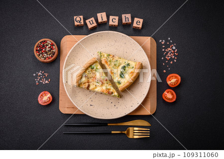 Delicious quiche with broccoli, cheese, chicken, spices and herbs Delicious quiche with broccoli, cheese, chicken, spices and herbs 109311060