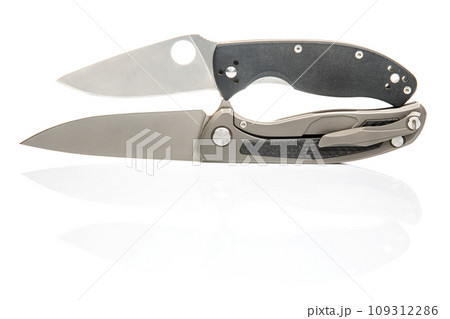 two folding knives on a white background. item for tourism and survival. 109312286