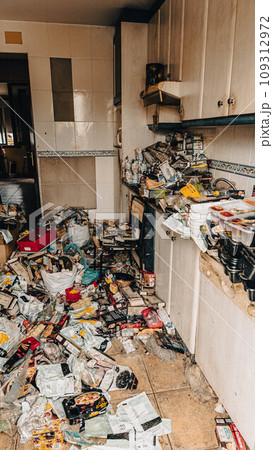 Trash in the kitchen Trash in the kitchen 109312972