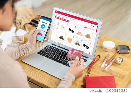 Woman shopping online on internet marketplace browsing for crucial sale items 109315383