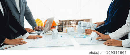Worker, architect and engineer work on real estate construction project oratory Worker, architect and engineer work on real estate construction project oratory 109315665