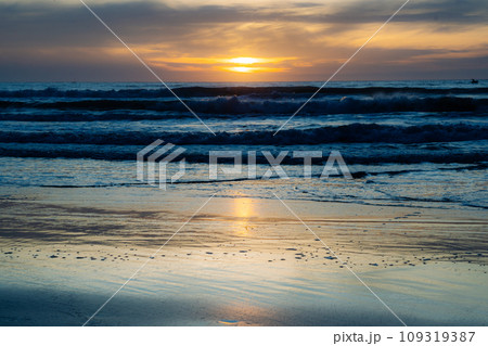 Affirmation photo You are free to be different Love yourself sunset over the sea horizon orange sky clouds dark sea water edge sand 109319387