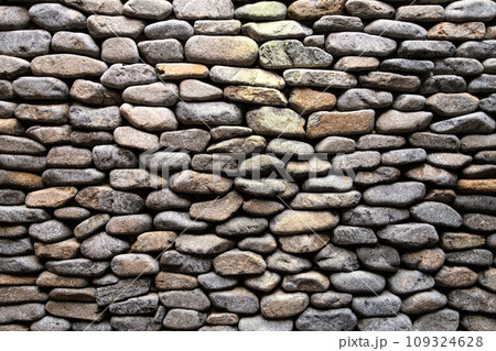 Decorative stone wall surface. Textured background. Decorative stone wall surface. Textured background. 109324628