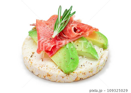 Rice Cake Sandwich with Fresh Avocado, Jamon and Rosemary Rice Cake Sandwich with Fresh Avocado, Jamon and Rosemary 109325029