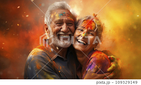 An elderly couple - a man and a woman with joyful faces at the celebration of the Holi festival. An elderly couple - a man and a woman with joyful faces at the celebration of the Holi festival. 109329149