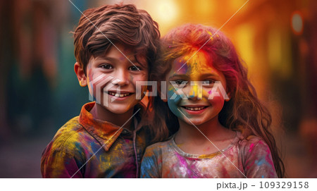 A boy and a girl with joyful faces at the celebration of the Holi festival. A boy and a girl with joyful faces at the celebration of the Holi festival. 109329158