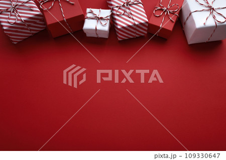 Gift boxes on color background, flat lay, space for text 109330647