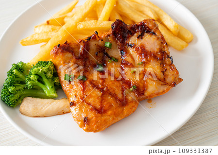 grilled chicken steak with potato chips or french fries 109331387