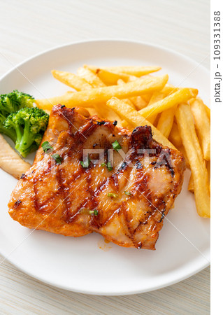 grilled chicken steak with potato chips or french fries 109331388