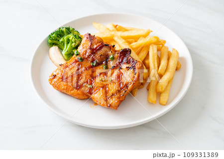 grilled chicken steak with potato chips or french fries 109331389