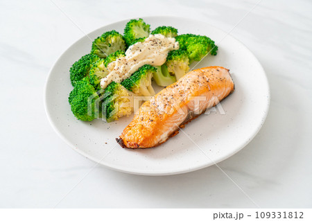 grilled salmon fillet steak with broccoli grilled salmon fillet steak with broccoli 109331812