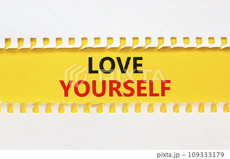 Love yourself symbol. Concept words Love yourself on beautiful yellow paper. Beautiful white paper background. Psychology love yourself concept. Copy space. 109333179