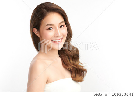 Beautiful smile of young woman with healthy white teeth on white background, Dental care. Dentistry concept. 109333641