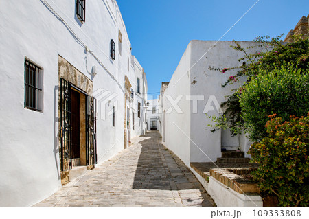Beautiful streets of Vejer de la Frontera, Spain, Andalusia region, Costa de la Luz, Cadiz district, White Towns, Iberian Peninsula, Old town. Ruta de los Pueblos Blancos Beautiful streets of Vejer de la Frontera, Spain, Andalusia region, Costa de la Luz, Cadiz district, White Towns, Iberian Peninsula, Old town. Ruta de los Pueblos Blancos 109333808