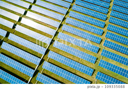 Aerial view of Solar Panels Farm Solar Cell Station. Production of clean energy. Renewable green alternative energy concept. 109335088