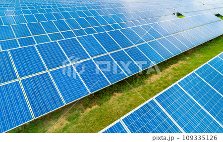 Aerial view of Solar Panels Farm Solar Cell Station. Production of clean energy. Renewable green alternative energy concept. Aerial view of Solar Panels Farm Solar Cell Station. Production of clean energy. Renewable green alternative energy concept. 109335126